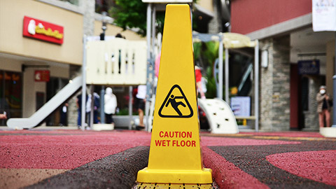 A safety cone in a children's playground