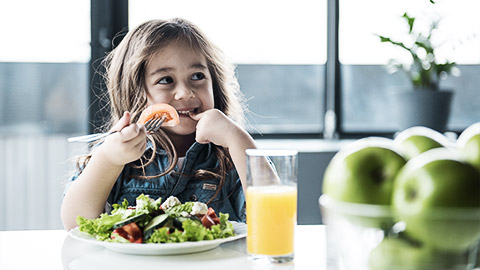 A child eating healthy