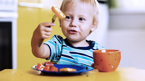 Child eating healthy food