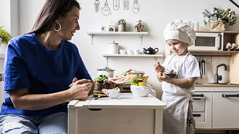 A child playing kitchen