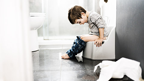 A two year old boy on chamber pot, successfull hygiene