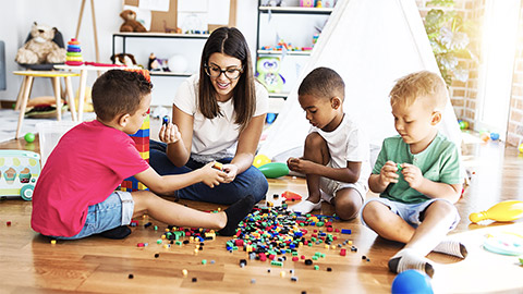 A young teacher with very young students