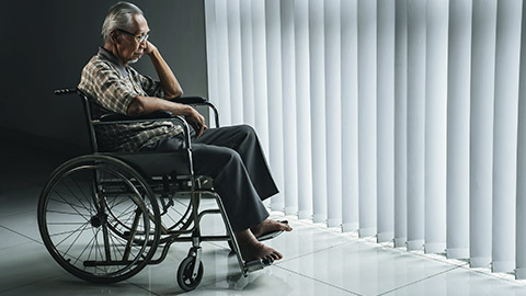 Lonely elder on wheel chair