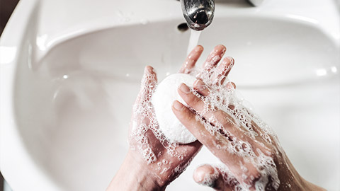 A pair of hands washing