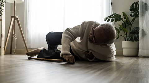 An old person on the ground after falling down