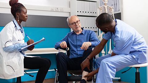 a doctor and a nurse examining a senior