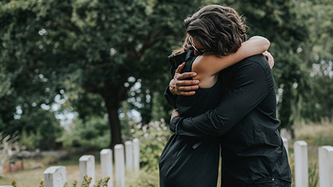 A husband consoling his wife