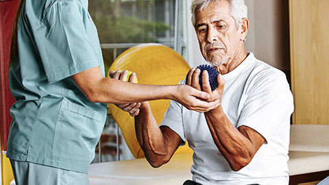 helping senior with stress ball