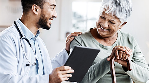 Elder and doctor talking