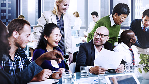 diverse people smiling on meeting