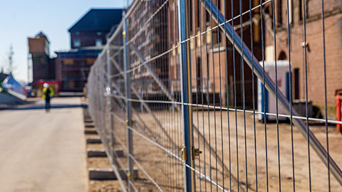 Protective fence around building site