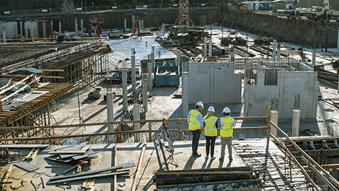 Construction workers evaluating effectiveness of existing control measures