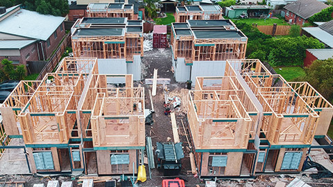 Aerial view of the construction of townhouses in an Australian suburb