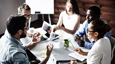 A group of employees in a discussion