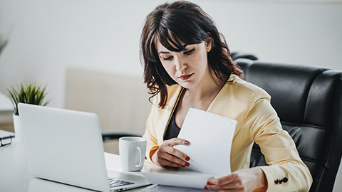 woman sorting papers