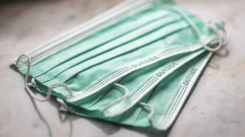 A close view of face masks sitting on a table