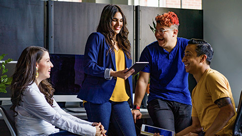 A group of employees enjoying a laugh