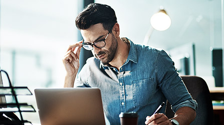 A business person reviewing implemented business strategies