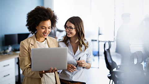 female colleague happy talking with computer