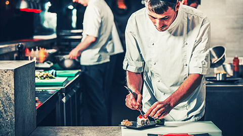 the kitchen staff busy at a seafood restaurant