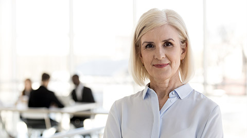 confident mature woman looking at camera