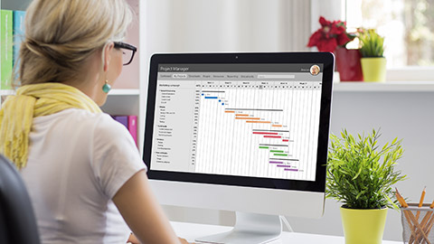 Woman using Gantt chart for project management