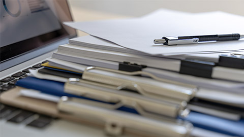 Businessman working reading documents graph