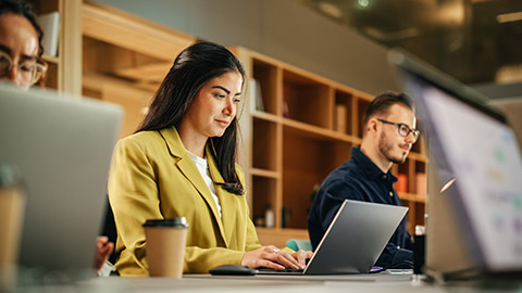 A group of workers in an office