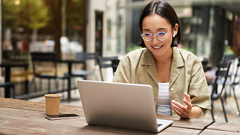 A person reading feedback on a laptop