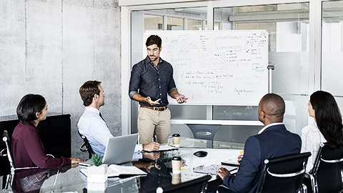 A group of marketers having a team meeting