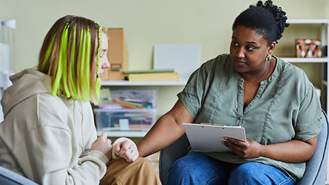 A worker talking to a client