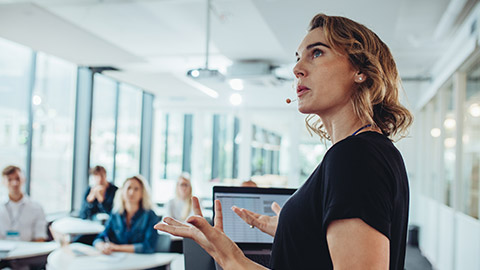 Businesswoman delivering a presentation at a conference