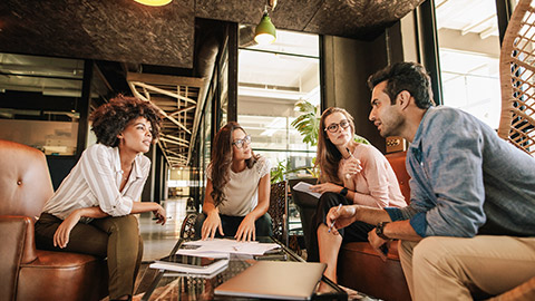 Group of creative people having a meeting in a modern office.