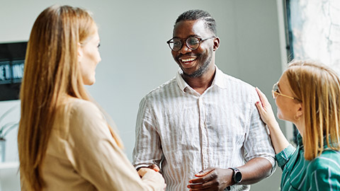 people having a meeting shaking hands handshake introducing each other in the office