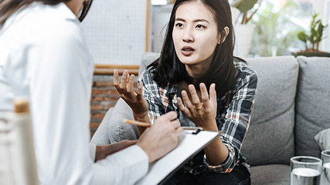 Health provider talking to a patient