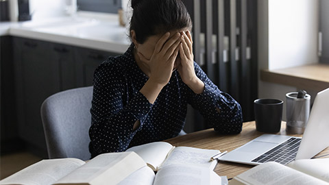 Exhausted female student feeling bad losing concentration unable to learn study