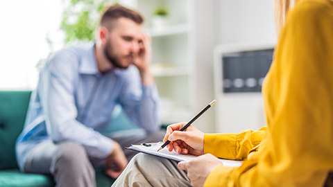 Counsellor talking to a client