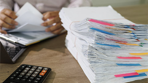 document achieves on folders papers at busy work desk office