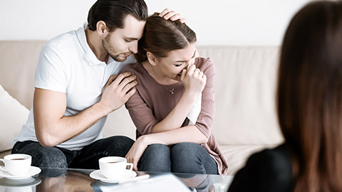 couple counselling; woman crying