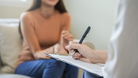 young woman consulting to a psychologist