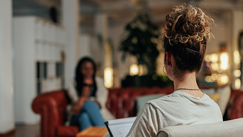 A counsellor talking to a client