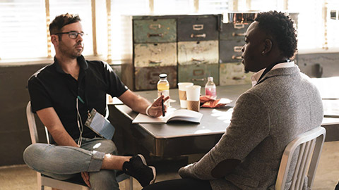 A counsellor listening to a client