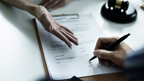 A person signing a contract