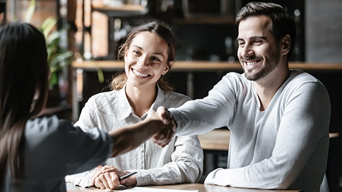 happy meeting with hand shake