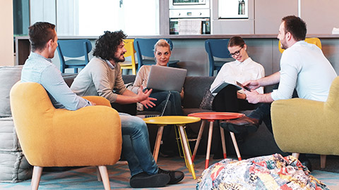 A group sitting around in a casual environment