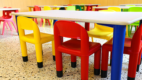 A close view of kid-friendly tables and chairs