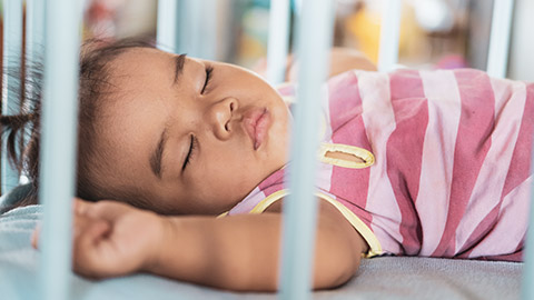 A close view of an infant sleeping