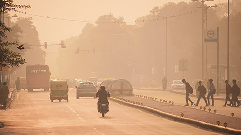 A busy road in a very polluted city