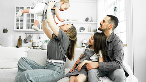 family playing with a baby