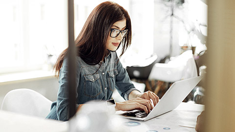 Young woman on computer